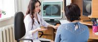 A physician consulting with a patient